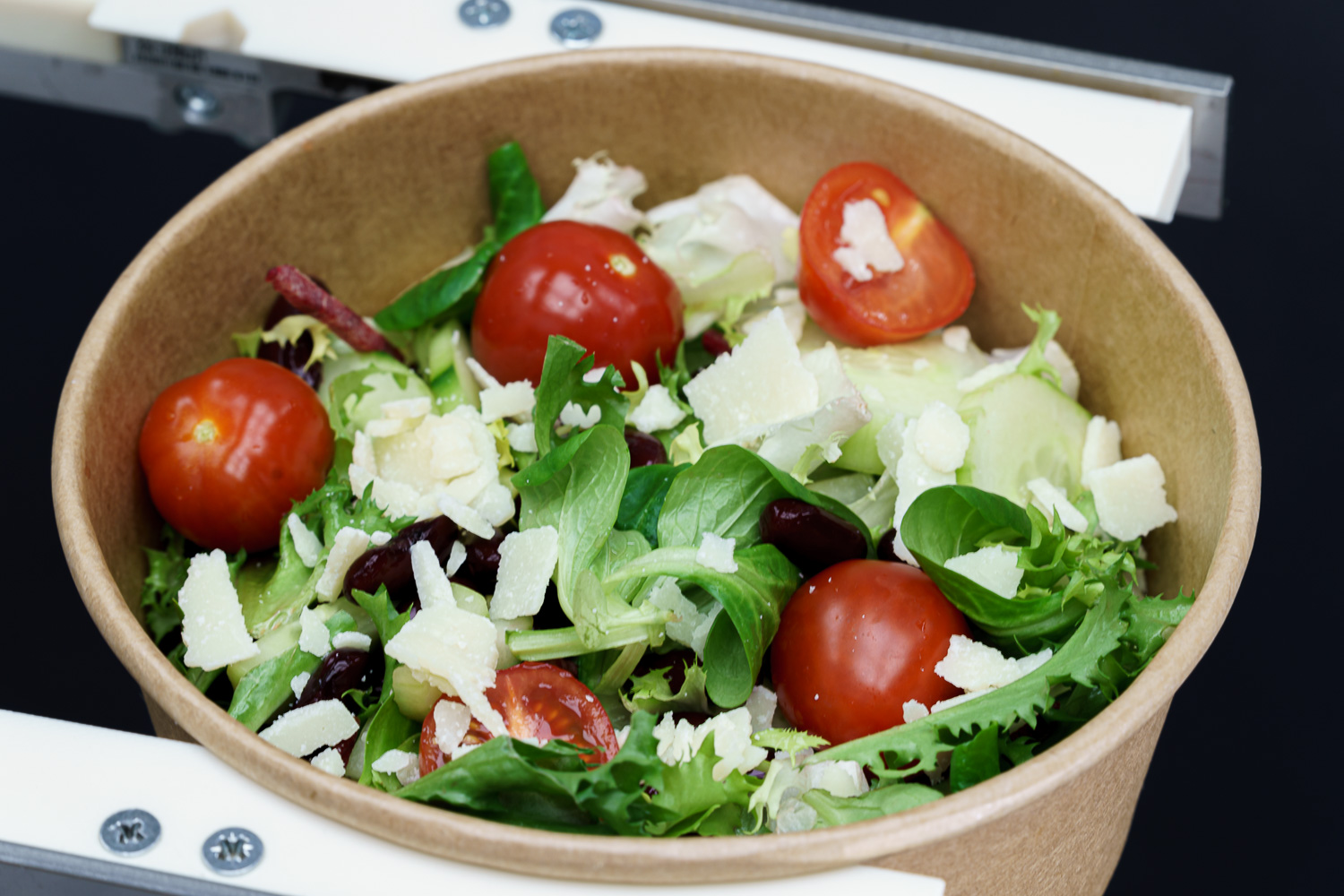 Green salad with cherry tomatoes and parmesan